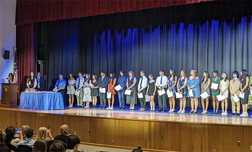 PHS students on stage during ceremony