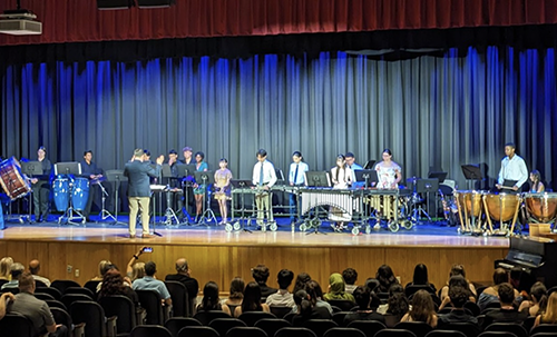 PHS band students on stage during ceremony