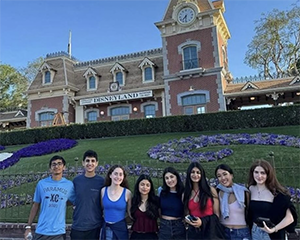 Eight PHS DECA students at Disneyland